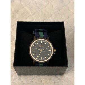 Men's NWOT "Oct 17" watch with navy and green wrist band.
